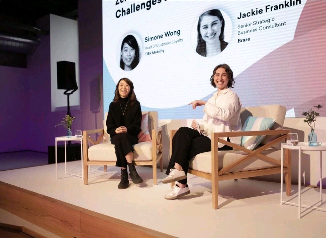 Simone Wong speaking on a panel at a Braze conference
